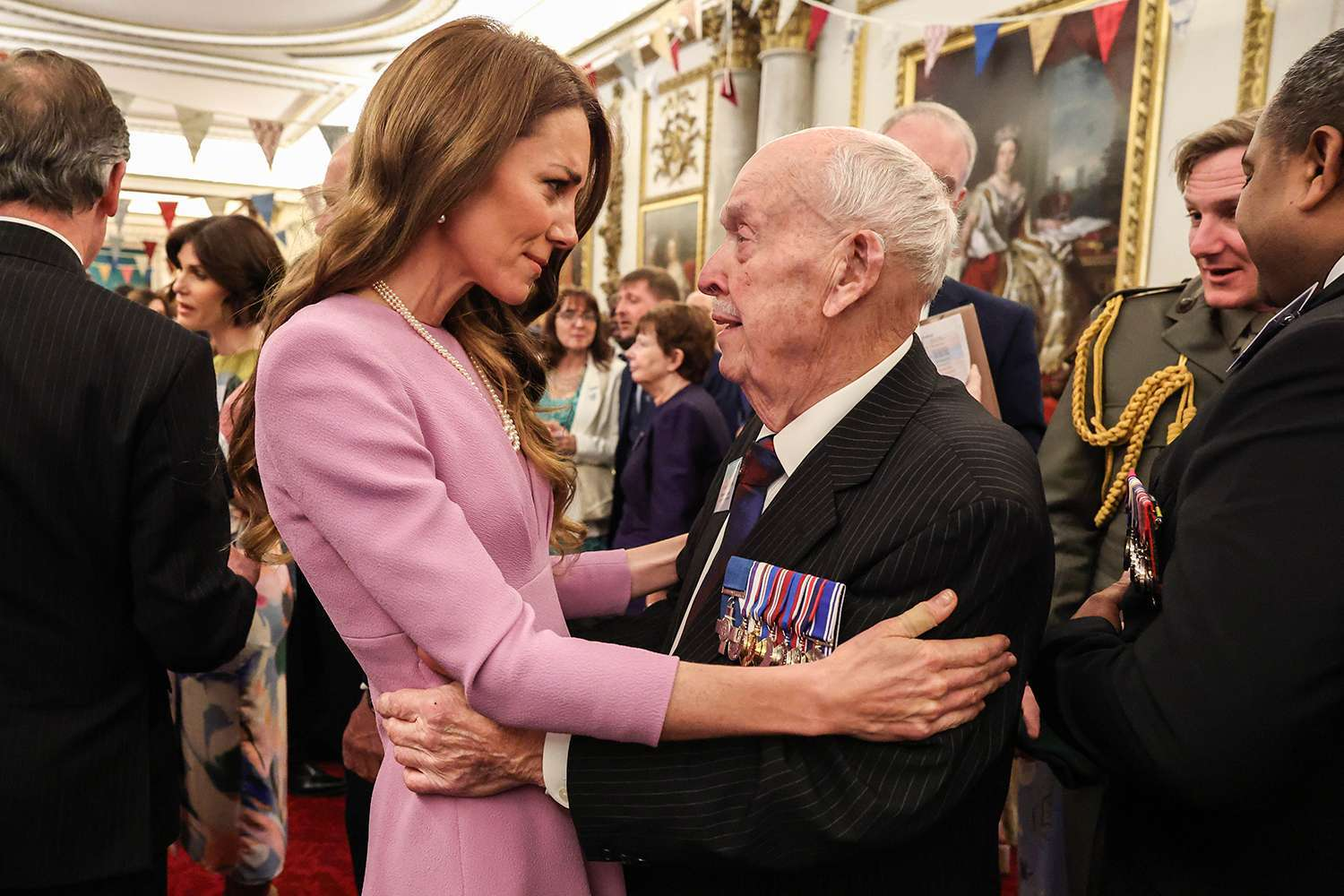 Kate's Tender Hug with Brave Ex-Cop Steals the Show at Queen's 100th Reception